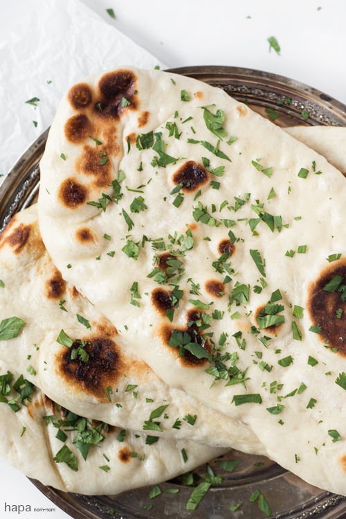 Naan, an Indian leavened flatbread, is soft, pillowy, and perfect for tearing and dipping!