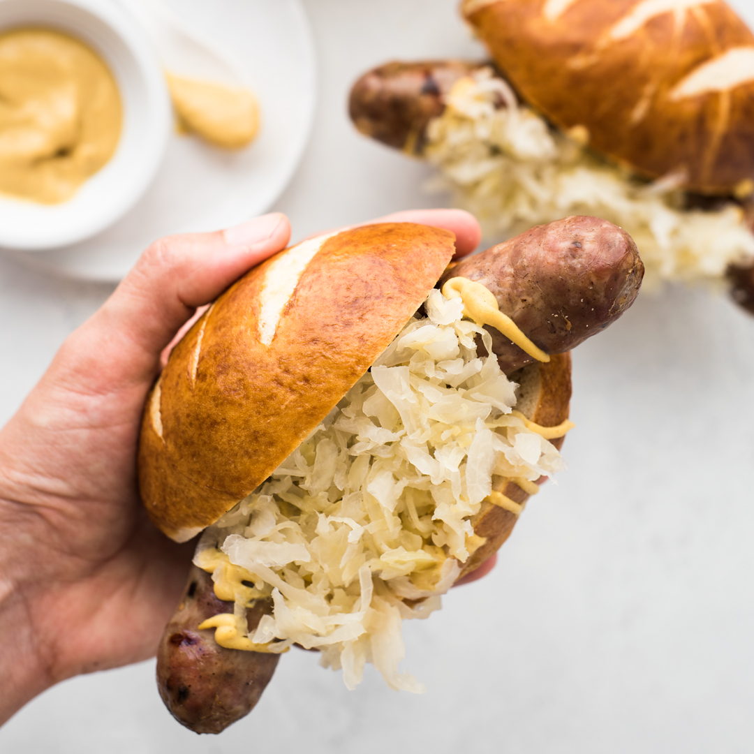 Beer Bratwurst Sandwich on a Homemade Pretzel Roll