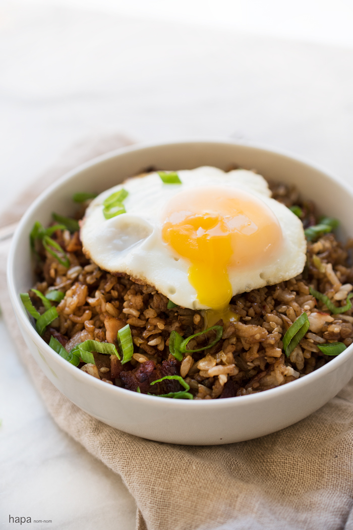 Try fried rice for breakfast with crispy bacon and toped with a fried egg. A hearty breakfast that's quick and easy!