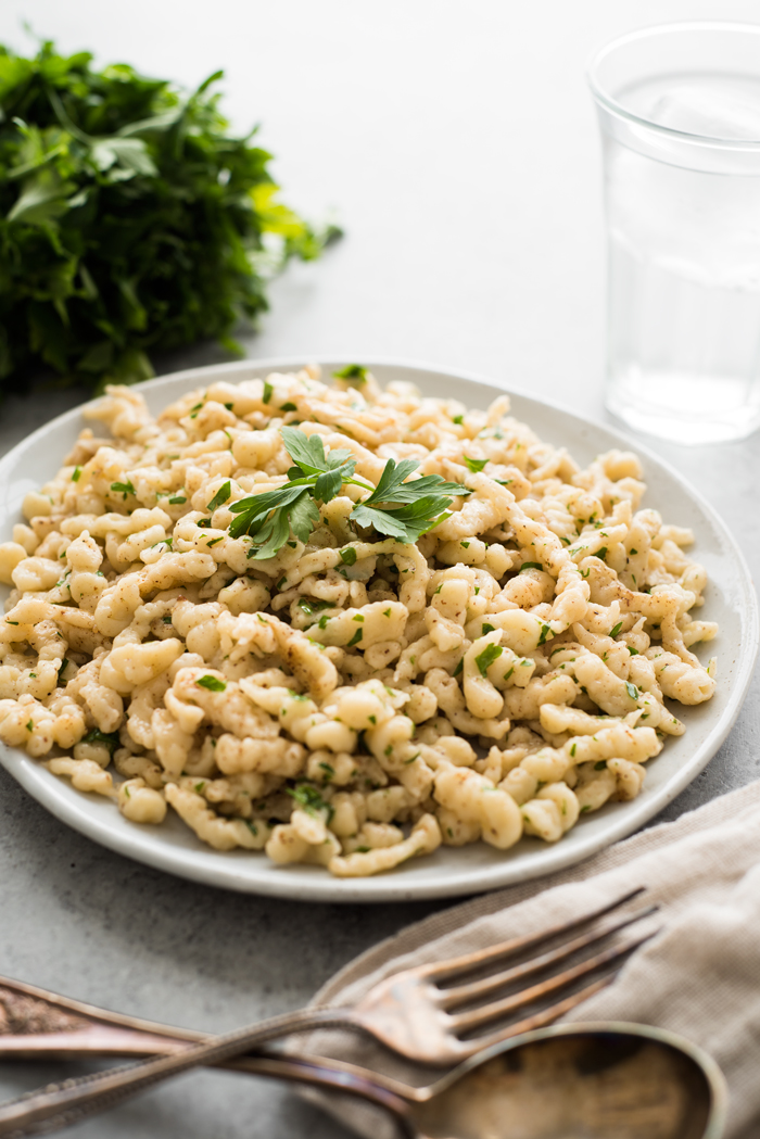 Spaetzle, or 'little sparrows' are a German staple. These small egg dumplings are tossed with brown butter, nutmeg, parsley, and are irresistible!