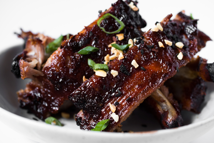 Oven baked Spicy Pork Ribs - they're fall off the bone good! And SO easy to make!