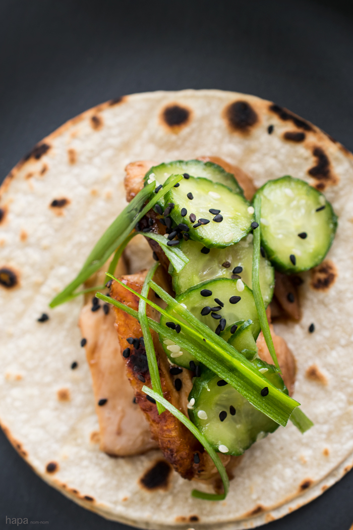 Crispy Chicken Teriyaki Tacos with Japanese Cucumber Salad and a Spicy Sriracha-Sour Cream
