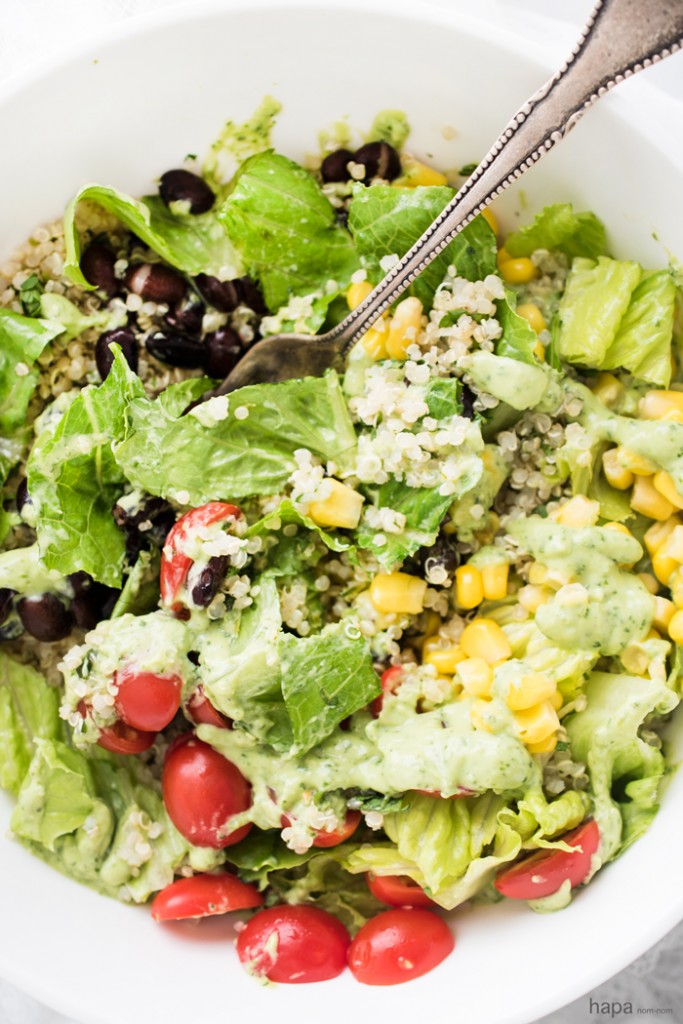 Super delicious and filling Quinoa Burrito Bowl with creamy Avocado-Lime Dressing