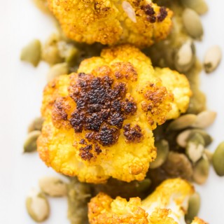 Roasted Cauliflower with Green Curry, Golden Raisins, and Pumpkin Seeds. This side dish has got some serious flavor!