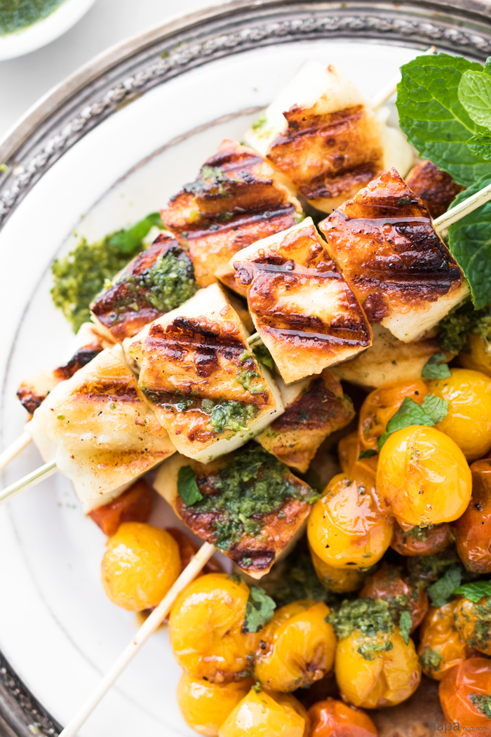 The ultimate grilled cheese - Halloumi Skewers with Roasted Tomatoes and a Spicy Green Chutney. Serve with warm Naan, and you've got one incredible meal!