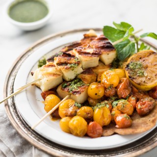 The ultimate grilled cheese - Halloumi Skewers with Roasted Tomatoes and a Spicy Green Chutney. Serve with warm Naan, and you've got one incredible meal!