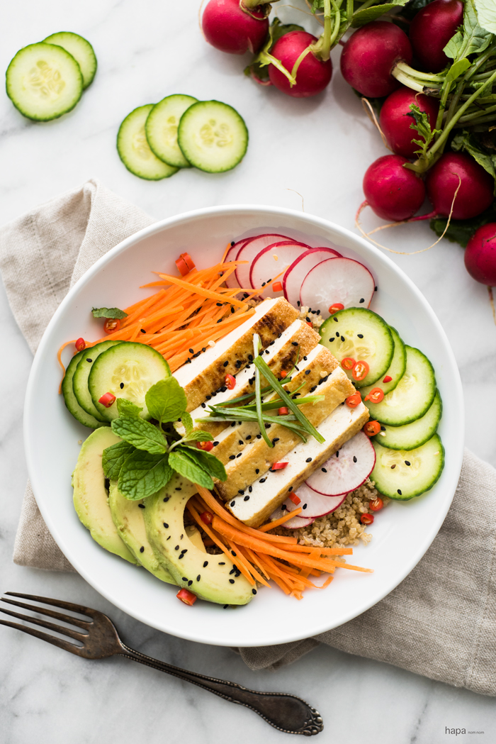30 minute Asian-Style Tofu Buddha Bowl with a sesame-lime dressing. Vegan friendly, nourishing, and delicious! 