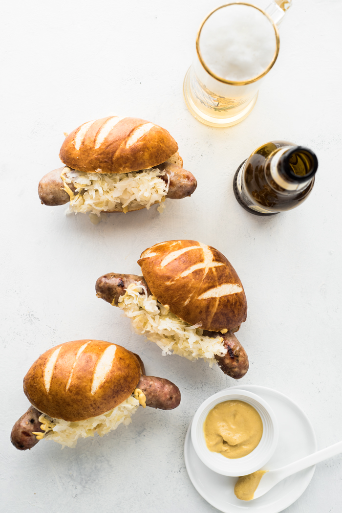 These beer brats are perfect for Oktoberfest, football parties, or just a damn good dinner!